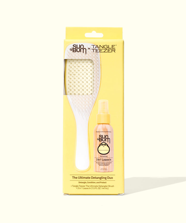 Sun Bum x Tangle Teezer Ultimate Detangling Duo package featuring a white brush with flexible bristles and a spray bottle of leave-in conditioner, set against a bright yellow background. Perfect for on-the-go hair care and protection. Sun Bum