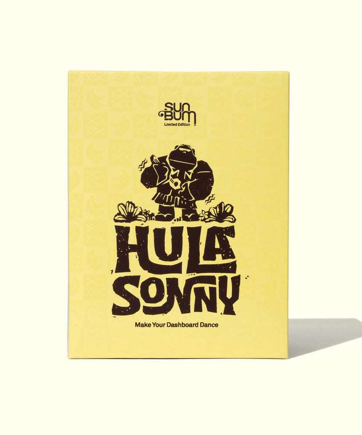 Yellow packaging of the Hula Sonny product with a dancing figure on the cover, by Sun Bum.