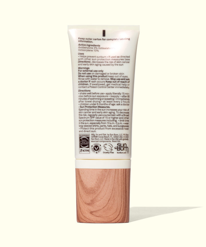 White tube with rose gold cap containing Daily 30 Glow moisturizer and SPF hybrid, showcasing product details and ingredients on the label. Sleek design for easy application and daily use. Sun Bum